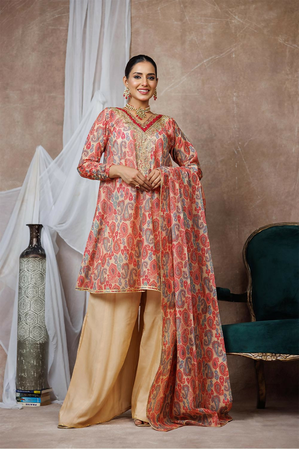 Senorita LDD-03127 three-piece formal suit; peach-pink kurta with gold embroidery, beige palazzo, dupatta.